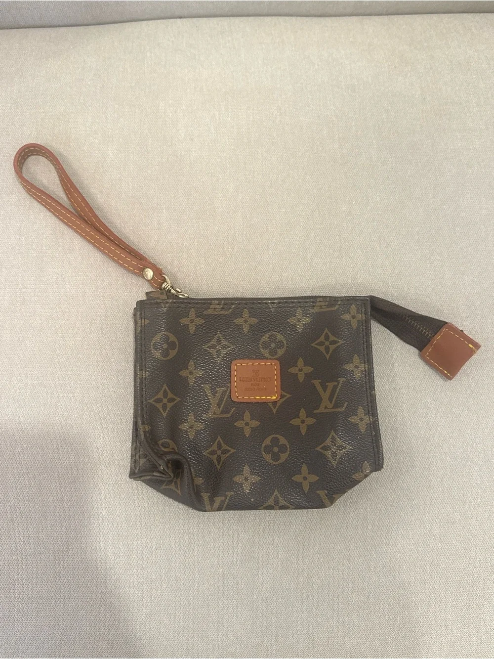 Louis Vuitton Monogram Canvas Wristlet in Brown and Tan - Picture 1 of 8